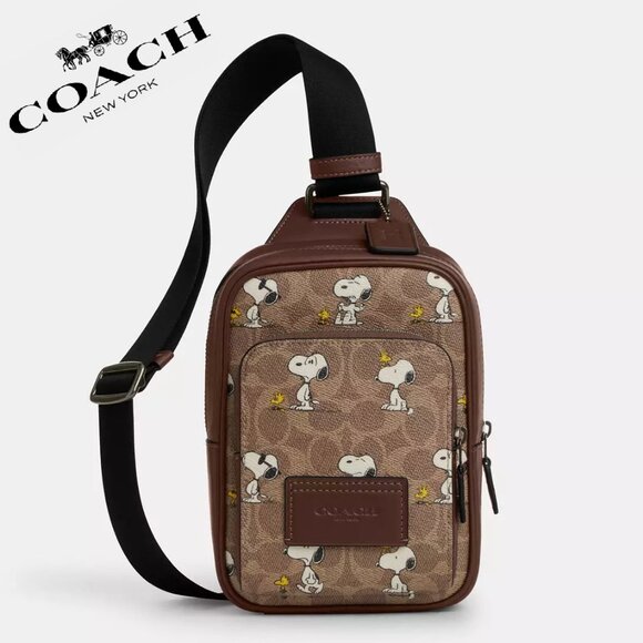 🐶 Coach X Peanuts Racer Sling Pack In Signature Canvas With Snoopy Print - Picture 1 of 8